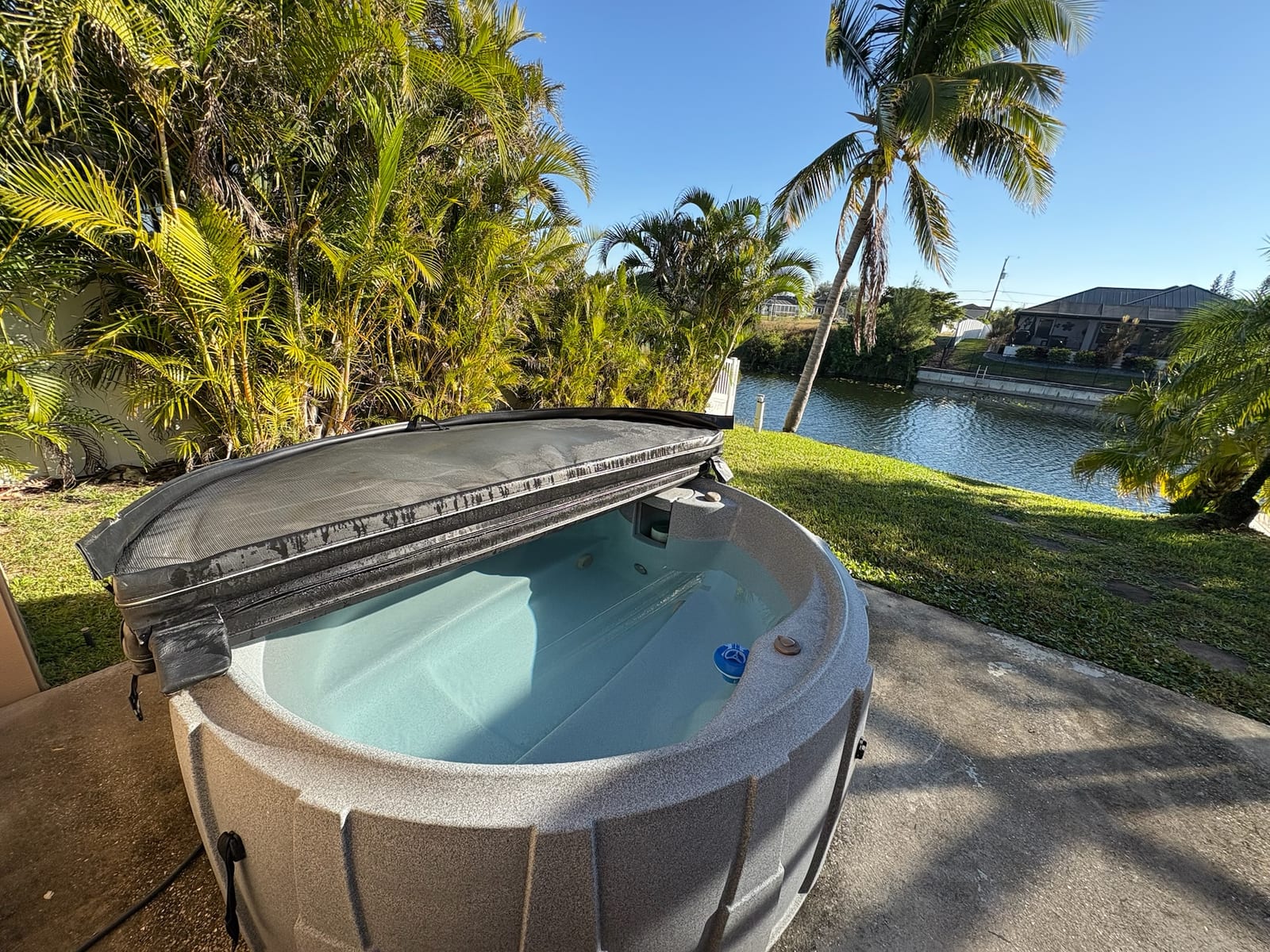 Cape Coral - Backyard hot tub with waterfront views