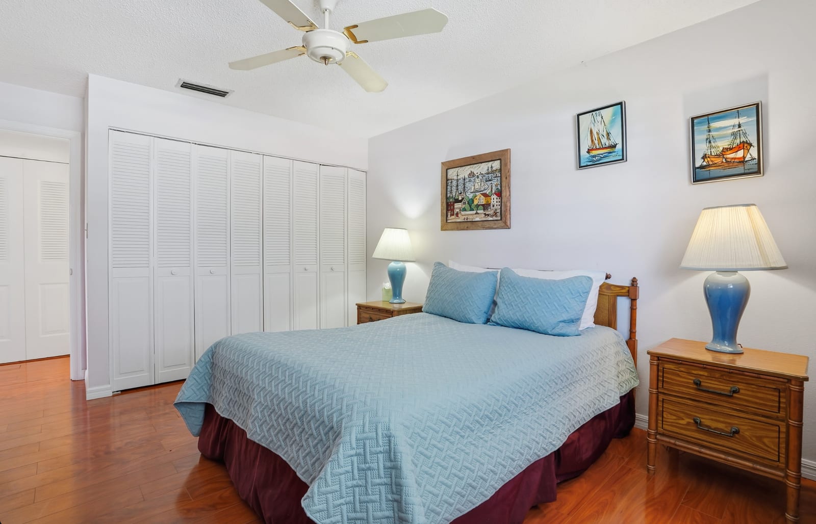 Bradenton - Coastal bedroom with blue bedding