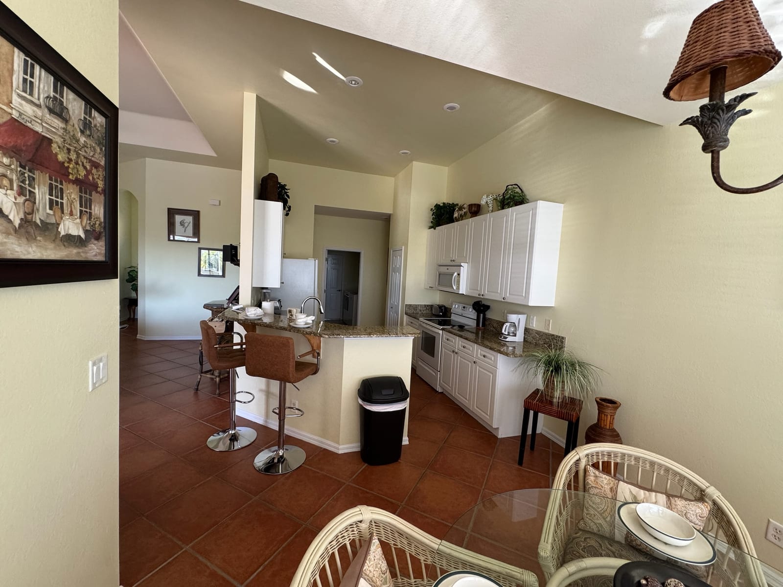 Cape Coral - Modern kitchen with white cabinets