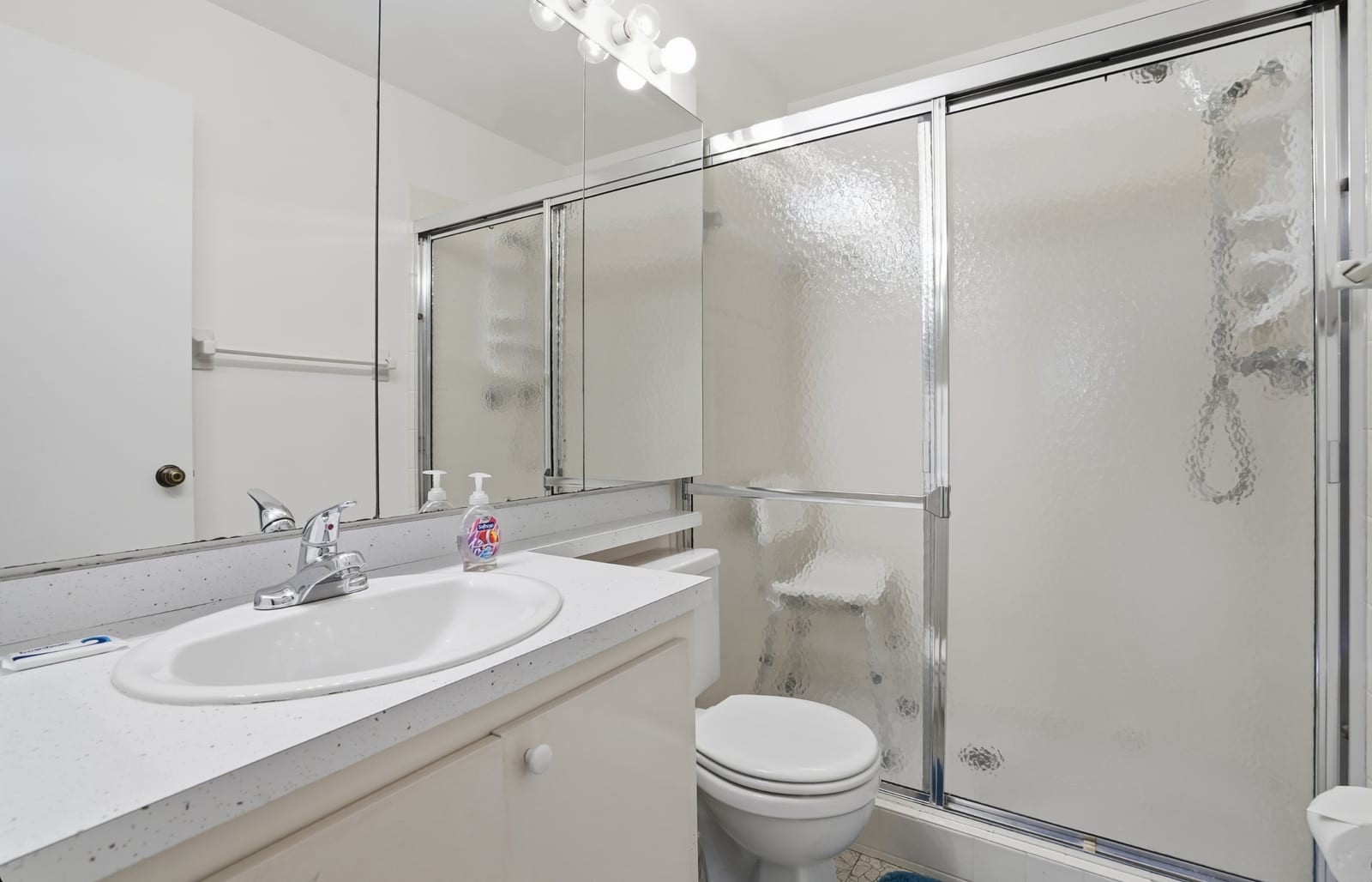 Bradenton - White bathroom with glass shower