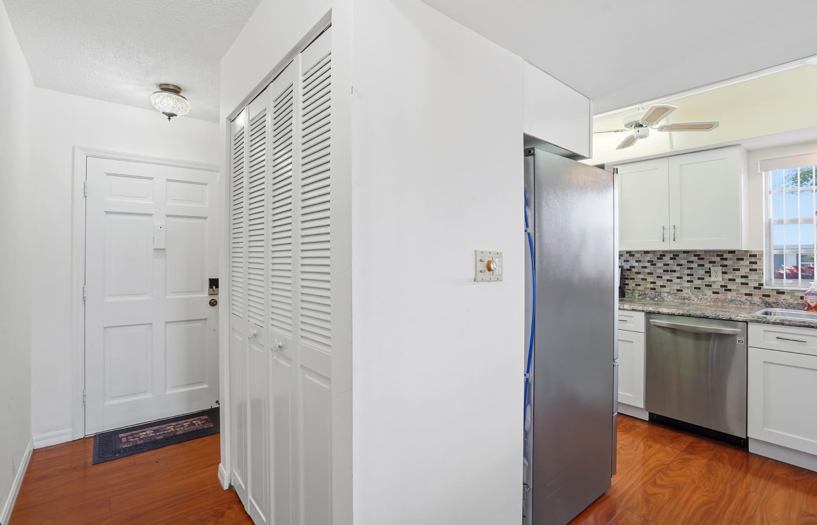 Bradenton - White kitchen with stainless appliances